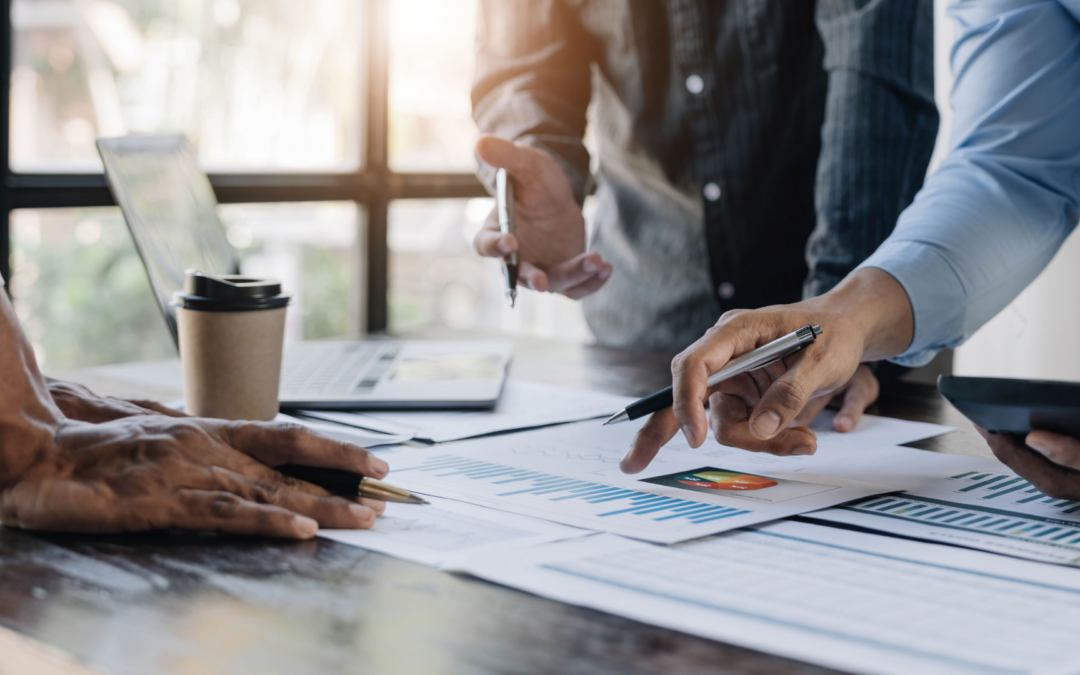 A collage showing diverse employees engaging in collaborative work, with graphics symbolizing stock ownership and financial growth, representing the benefits of Employee Stock Ownership Plans (ESOPs).